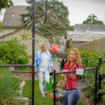 couple working on their backyard makeover
